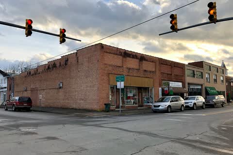 Brick commercial buildings at a Main Street intersection in Andrews