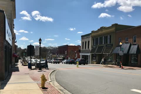 Historic storefronts and street lamps along Main Street in Belmont