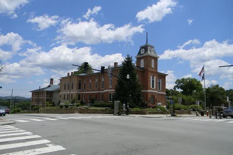 Brick Transylvania County Courthouse with a clock tower in downtown Brevard