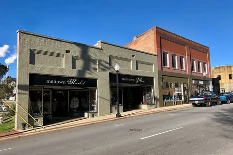 Brick storefronts and a street lamp along Main Street in Canton