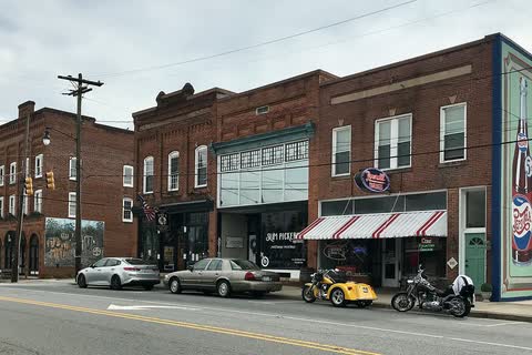 Row of historic brick storefronts in downtown Catawba