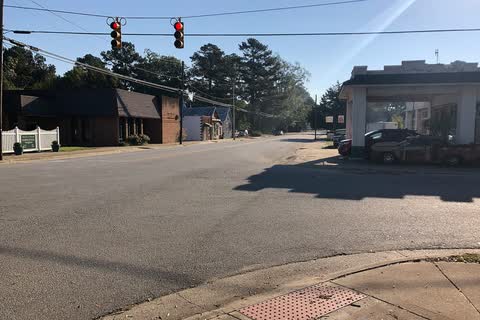 A quiet intersection with small commercial buildings in Harrellsville
