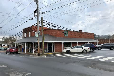 Brick commercial buildings at a Main Street intersection in Hayesville