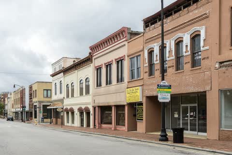 Ornate 19th-century brick storefronts along North Elm Street in Lumberton