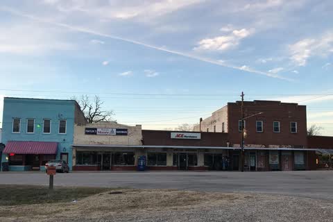 A row of brick and painted commercial buildings in downtown Norlina