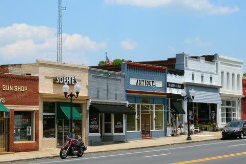 Colorful historic storefronts along Main Street in Pineville