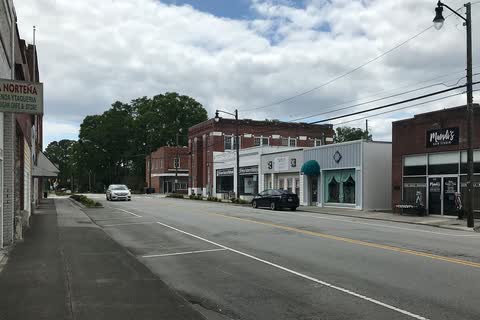 Storefronts along a wide downtown street in Richlands