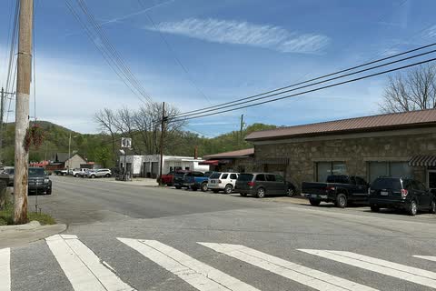 Main street in downtown Robbinsville with low stone and brick commercial buildings
