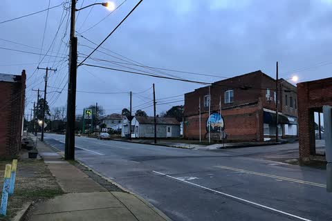 A downtown intersection with brick commercial buildings in Seaboard