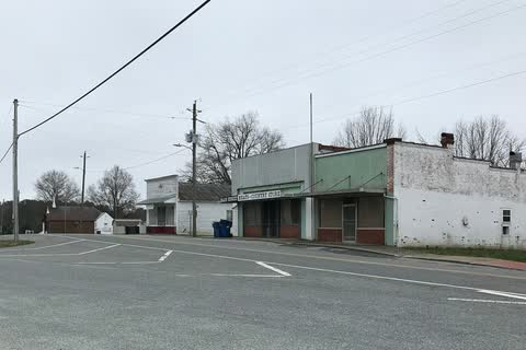 Old commercial buildings along a quiet Main Street in Staley