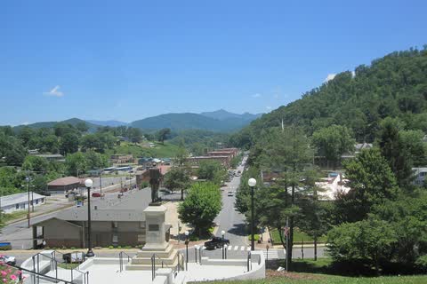 View down over downtown Sylva and its main street toward green mountains