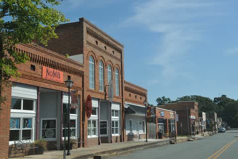 Historic brick commercial buildings along Main Street in downtown Waxhaw